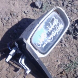 Used left side mirror for 2006 Ford Bantam shown from front angle on white background.Used left side mirror fo
