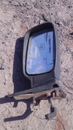 Right side car mirror for Ford Sierra, used condition, shown at slight angle on white background.Right side ca