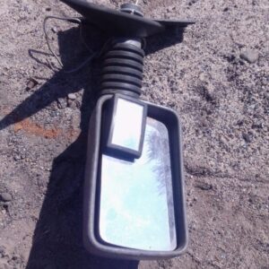 Right side exterior mirror for Fiat Uno shown from front angle, used condition.Right side exterior mirror for