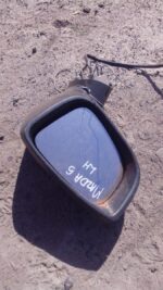 Left side exterior mirror for Mazda 5, viewed from the front, used condition, showing mounting bracket and gla