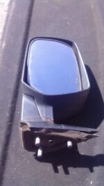 Left side mirror for Ford Ranger viewed from the front, showing the mirror glass and mounting base, used condi