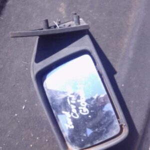 Left side exterior mirror for Ford Cortina shown from front angle, used condition visible.Left side exterior m