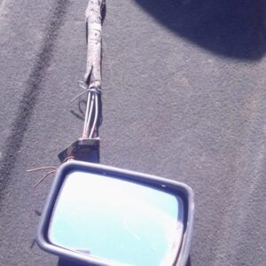 Left side mirror for Volkswagen Golf 1, used condition, shown detached on a plain light background.Left side m