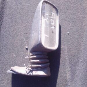 Left side mirror for Fiat Uno, shown from front angle, used condition with slight wear visible.Left side mirro