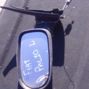 Left side mirror for a 2003 Fiat Palio, shown from the front angle, used condition.Left side mirror for a 2003
