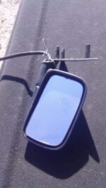 Right side exterior mirror for Volkswagen Jetta 2, used condition, shown from front angle.Right side exterior