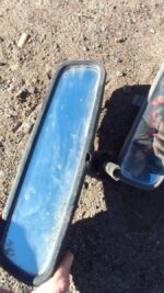 Rear view mirror for Volkswagen Golf 4, shown from front angle, used condition.Rear view mirror for Volkswagen