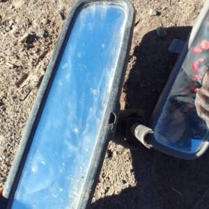 Rear view mirror for Volkswagen Golf 4, shown from front angle, used condition.Rear view mirror for Volkswagen