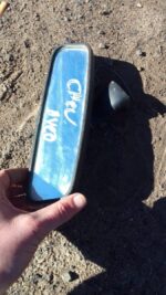 Rearview mirror for Chevrolet Aveo shown from front angle, used condition.Rearview mirror for Chevrolet Aveo s