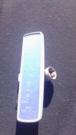 Used rear view mirror for Volkswagen Polo Vivo, shown from the side angle.Used rear view mirror for Volkswagen