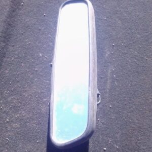 Rear view mirror for Audi A4 shown from front angle, used condition visible with mounting bracket attached.Rea