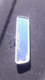 Rear view mirror for VW Polo 6 Cross shown from front angle, used condition visible in image.Rear view mirror