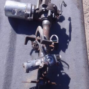 Used electric steering column for Nissan Micra, angled view showing wiring and mounting points.Used electric s