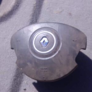 Front view of a used Renault Clio 3 steering wheel airbag module with central airbag cover.Front view of a use