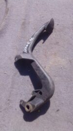 Close-up of a used BMW E36 car pedal showing wear details from a frontal angle.Close-up of a used BMW E36 car