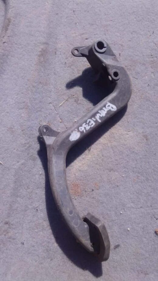 1997 Bmw E36 Pedal - Used Used BMW E36 clutch and brake pedals mounted on metal bracket, front angle view.Used BMW E36 clutch and brake