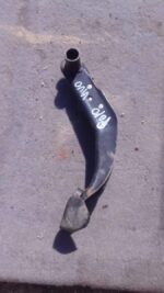 Used brake pedal for Volkswagen Polo Vivo shown from the side on a plain background.Used brake pedal for Volks