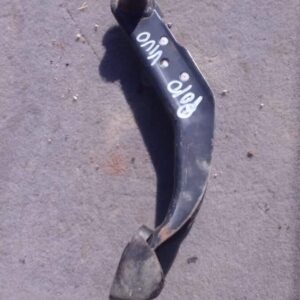 Used brake pedal for Volkswagen Polo Vivo shown from the side on a plain background.Used brake pedal for Volks