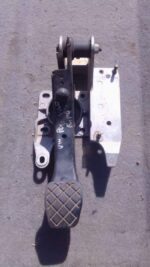 Used brake pedal for a Volkswagen Polo Vivo, angled view showing pedal and mounting bracket.Used brake pedal f