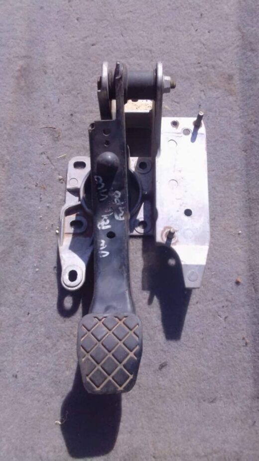 2012 Volkswagen Polo Vivo Brake Pedal - Used Used brake pedal for a Volkswagen Polo Vivo, angled view showing pedal and mounting bracket.Used brake pedal f