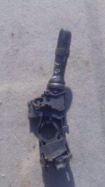 Used combination switch for Peugeot 107 shown from front angle with control stalks visible.Used combination sw