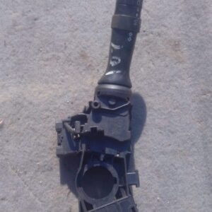Used combination switch for Peugeot 107 shown from front angle with control stalks visible.Used combination sw