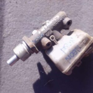 Used brake master cylinder viewed from the top, showing reservoir and mounting points.Used brake master cylind