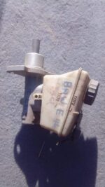 Used brake master cylinder for BMW E46, front view showing reservoir and mounting points.Used brake master cyl