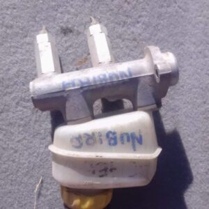 Used brake master cylinder viewed angled from front left, showing reservoir and mounting points.Used brake mas