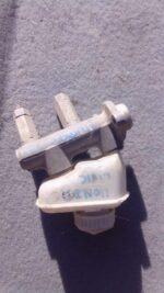 Front-angle view of a used brake master cylinder for Honda Civic, showing reservoir and mounting points.Front-