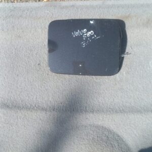 Used fuel flap for Volvo S80, front angled view showing exterior surface and mounting points.Used fuel flap fo