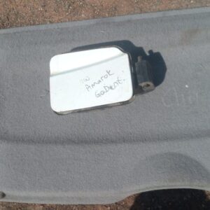 Used fuel flap for Volkswagen Amarok viewed from front, showing hinge and latch area.Used fuel flap for Volksw