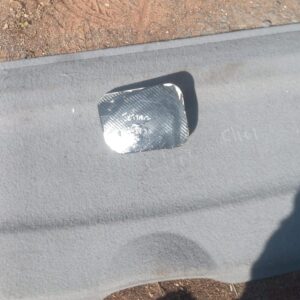 Close-up of a used fuel flap for Volkswagen Jetta 2 shown from the front angle.Close-up of a used fuel flap fo