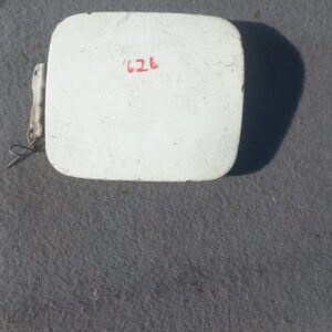 Front view of a used set of two Mazda 626 fuel flaps with mounting hardware attached.Front view of a used set