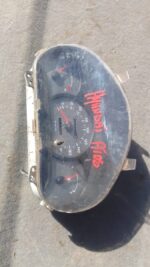Front view of used Hyundai Atos dashboard cluster with gauges and instrument panel visible.Front view of used