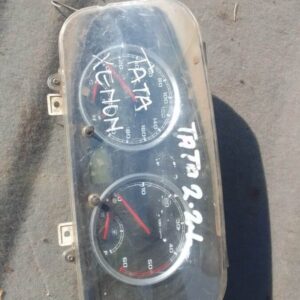 Front view of a used Tata Xenon truck cluster gauge panel with speedometer and warning lights visible.Front vi