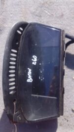 Used BMW E60 instrument cluster dashboard panel shown from front angle with clear gauges and display.Used BMW