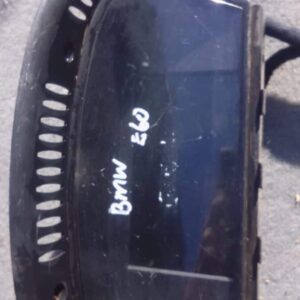 Used BMW E60 instrument cluster dashboard panel shown from front angle with clear gauges and display.Used BMW