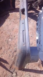 Rear angled view of a used Land Rover Discovery bumper with integrated reflector and mounting points.Rear angl