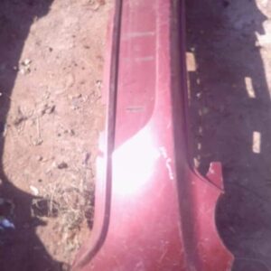 Rear view of used rear bumper for Alfa Romeo Giulietta showing complete bumper assembly and mounting points.Re