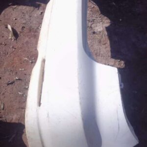 Used rear bumper for Mazda 6 shown from the back at an angle, displaying wear and mounting points.Used rear bu