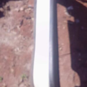 Rear view of a used Nissan Sentra rear bumper showing mounting points and black plastic lower trim.Rear view o