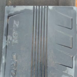 Used engine cover from a Dodge Nitro, shown front-facing on a white background.Used engine cover from a Dodge