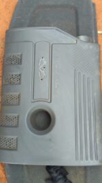Used 2006 J5 engine cover viewed from front angle showing mounting brackets and surface wear.Used 2006 J5 engi