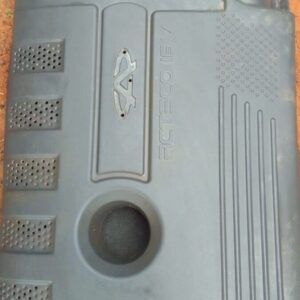 Used 2006 J5 engine cover viewed from front angle showing mounting brackets and surface wear.Used 2006 J5 engi