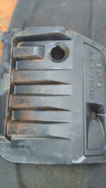 Used engine cover for Jeep Compass shown from the top angle with visible mounting points and surface details.U