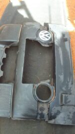 Used VW Polo engine cover shown flat on a white background, top side visible.Used VW Polo engine cover shown f