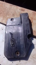 Front-facing view of a used Hyundai Atos engine cover showing surface details and mounting points.Front-facing