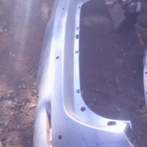 Rear view of a used rear bumper for Toyota Fortuner showing mounting points and shape details.Rear view of a u
