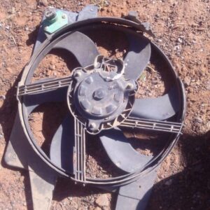 Front view of used radiator fan assembly for Nissan NP200 1.6 8v, showing blades and mounting points.Front vie